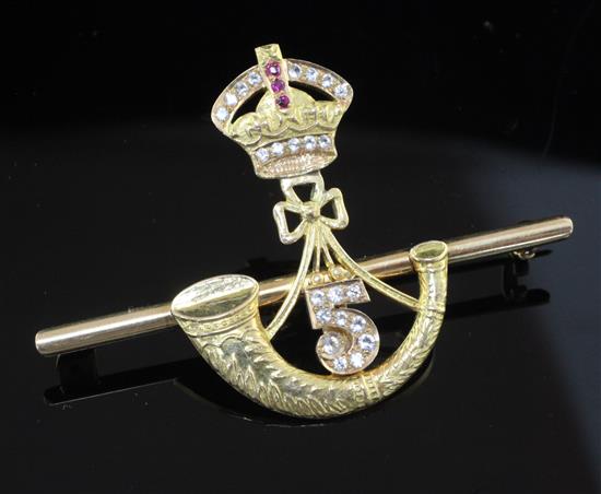 An Indian? high carat gold and gem set military related sweethearts bar brooch, 2.25in.